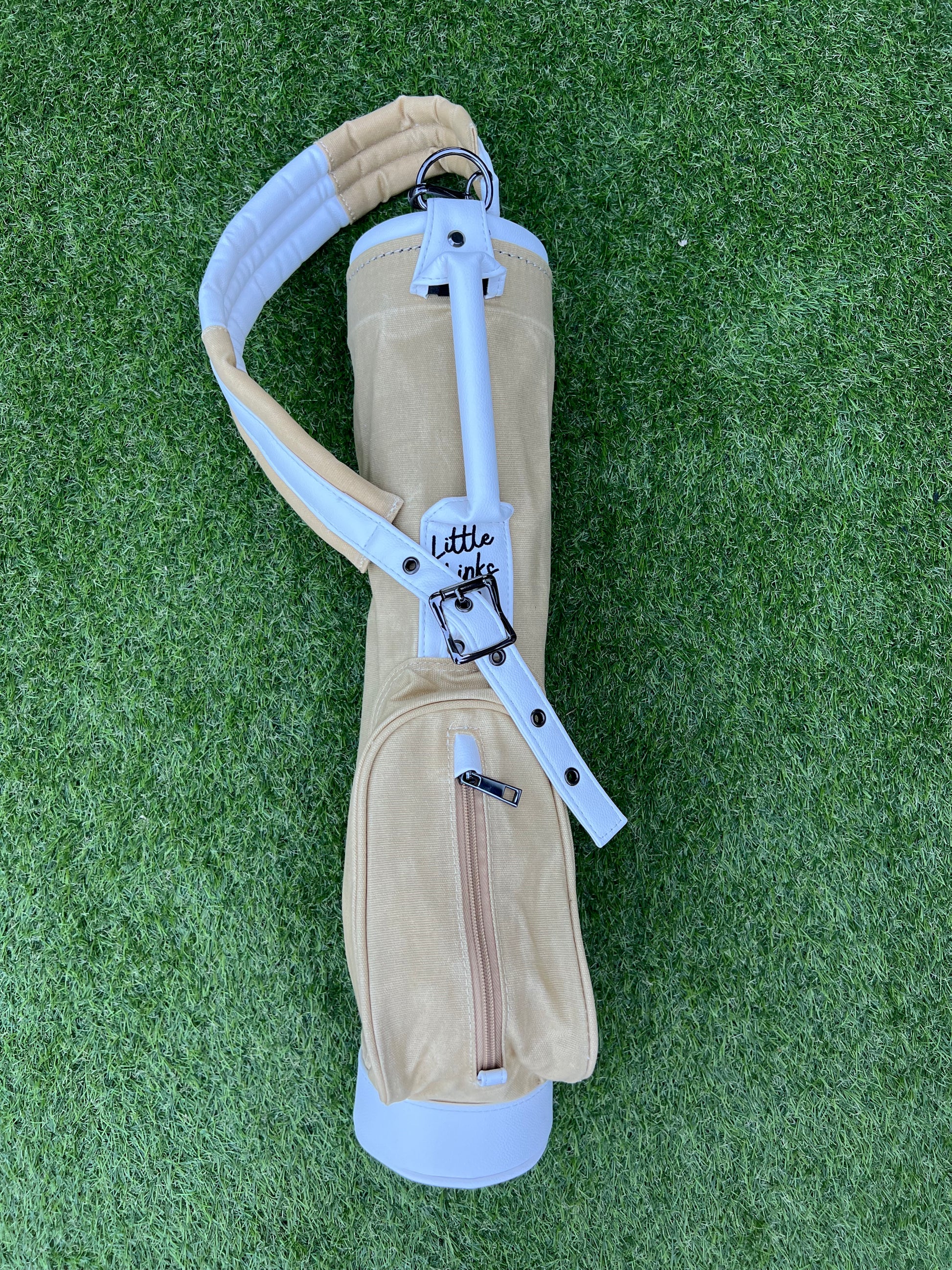 Sand coloured canvas toddler golf bag.